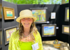 Julie Wiegand with her work on display.