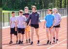CAROLINE OTTEN explains how to run a relay race to grade schoolers.