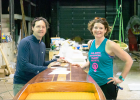 Shane Camden, owner of New Haven Paddle Stop, and paddleboard racer, Lauren Rodriquez.